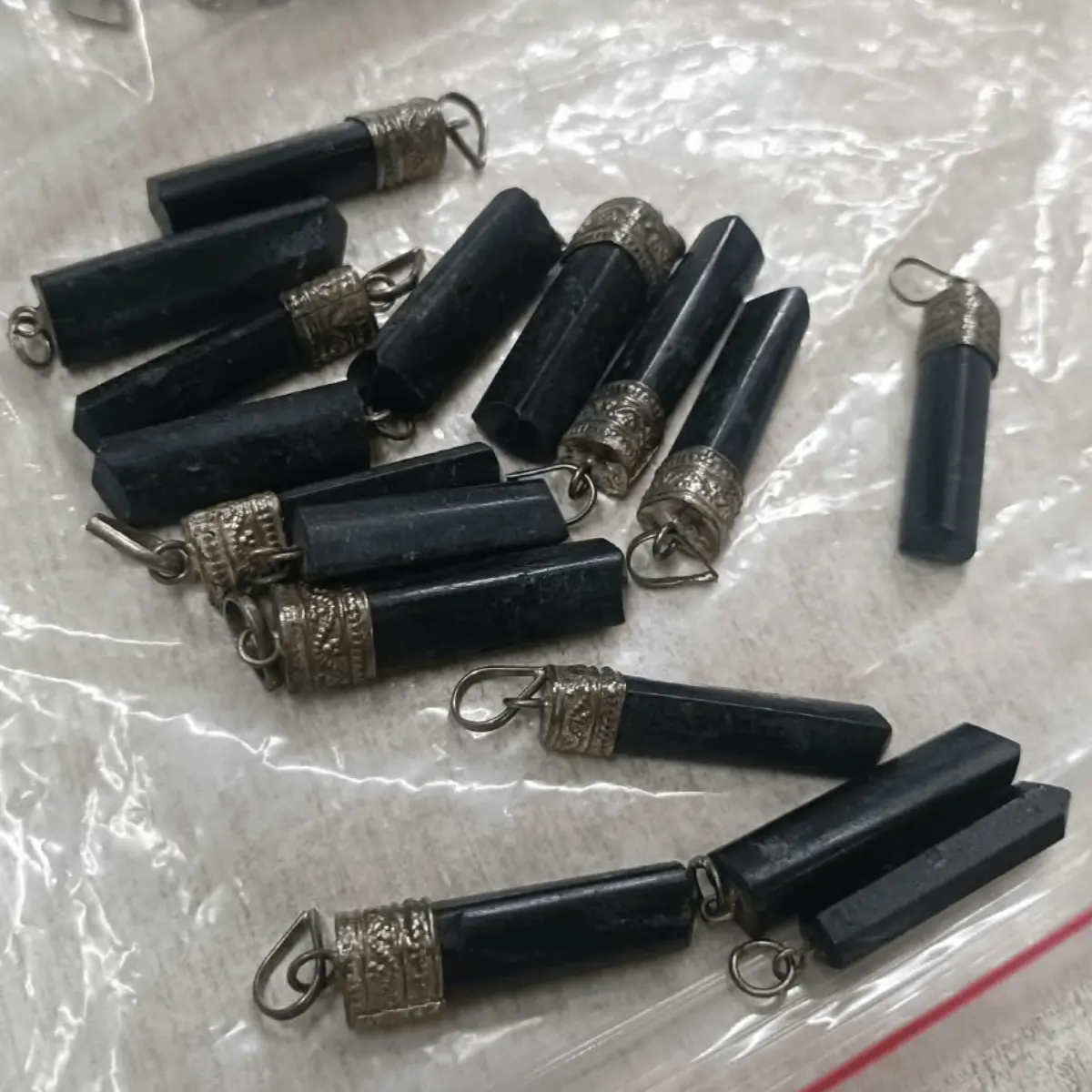 black tourmaline pendants in metal